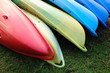 Colorful kayaks in stack