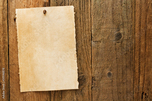 Photo: Old rustic aged wanted cowboy sign on parchment Old rustic aged wanted cowboy sign on parchment