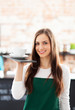 Portrait of waitress in cafe