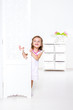 Photo: Hiding behind shutters Hiding behind shutters