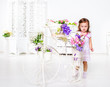 Girl playing with flowers