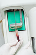 Woman performin hematological test.
