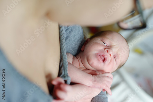 Photo: newborn in mother's hands newborn in mother's hands