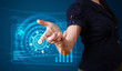 Woman pressing high tech type of modern buttons