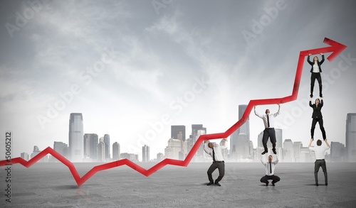 Photo: Teamwork and corporate profit Teamwork and corporate profit