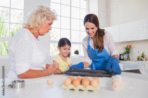 Photo: Girl preparing cookies Girl preparing cookies
