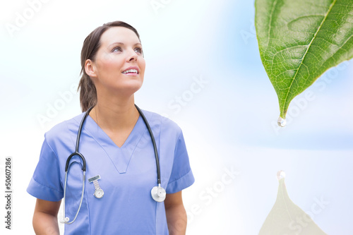Photo: Nurse looking up happily Nurse looking up happily