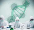 Chemists working in protective suit with futuristic interface sh