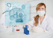 Chemist working in protective suit with futuristic interface sho