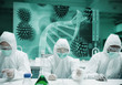 Scientists working in protective suite with futuristic interface