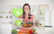 Woman preparing dinner using futuristic interface