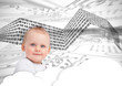 Portrait of a cute baby over clouds and binary codes