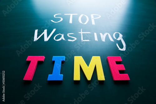Photo: Stop wasting time concept Stop wasting time concept