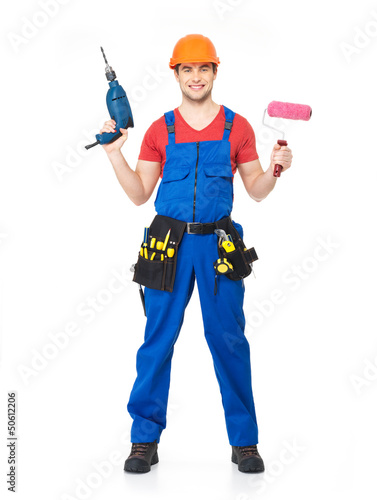 Photo: Handyman with tools full portrait isolated Handyman with tools full portrait isolated