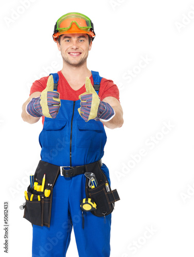Photo: handyman with tools showing thumbs up sign handyman with tools showing thumbs up sign
