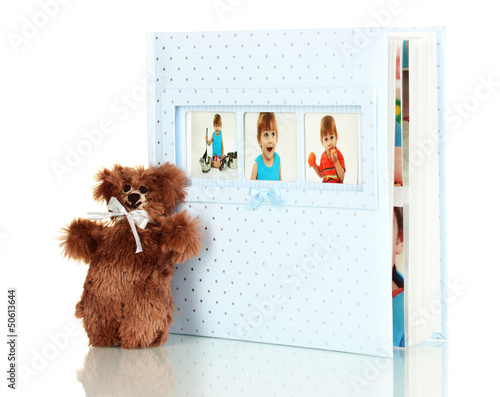 Photo: Baby photo album isolated on white Baby photo album isolated on white