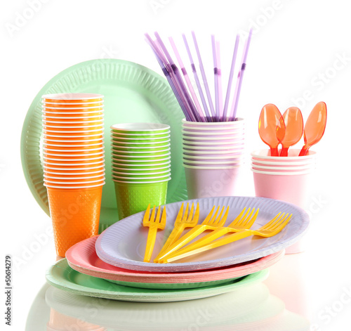 Photo: Multicolored plastic tableware isolated on white Multicolored plastic tableware isolated on white