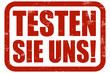 Grunge Stempel rot TESTEN SIE UNS!