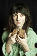 beggar woman eating bread