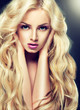 Blondy girl with long curly hair