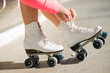 Close-up Of Legs With Roller Skating Shoe