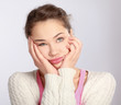 A young emotional girl, isolated on white, closeup