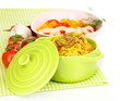Delicious pilaf with vegetables isolated on white