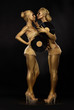 Gloden Women with Vinyl Records on Black. Gilded Bodyart