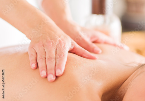 Photo: Woman Receiving Massage Woman Receiving Massage