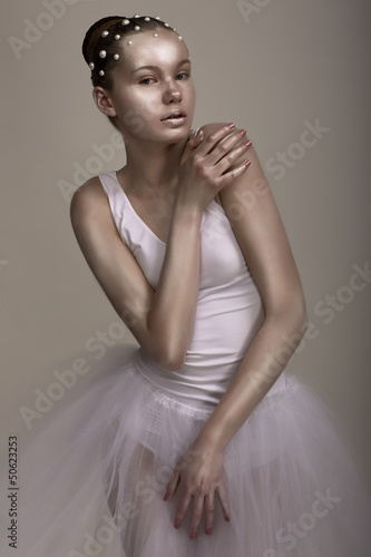 Photo: Extravagance. Performance. Woman with Brown - Silver Makeup Extravagance. Performance. Woman with Brown - Silver Makeup