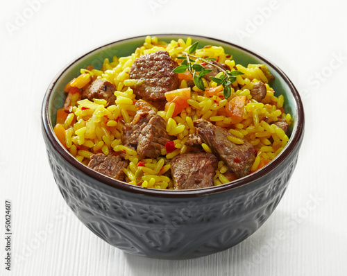 Photo: Uzbek national dish plov in a bowl Uzbek national dish plov in a bowl