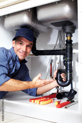 Photo: Plumber. Plumber.