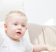little boy is looking forward