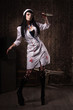 Crazy dead nurse with knife in the hand