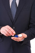 Business man with contact lens case.