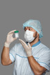young doctor with container for analysis