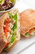 ciabatta panini sandwich with chicken and tomato