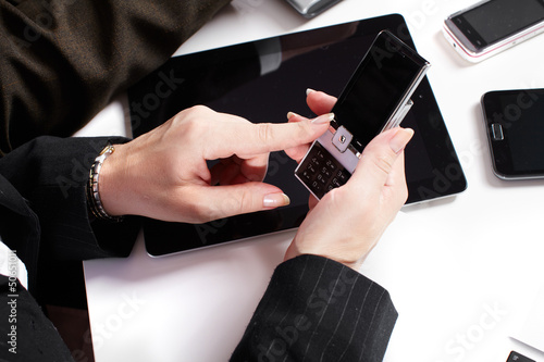 Photo: Business people group working with laptop. Business people group working with laptop.