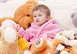 Little girl with toys