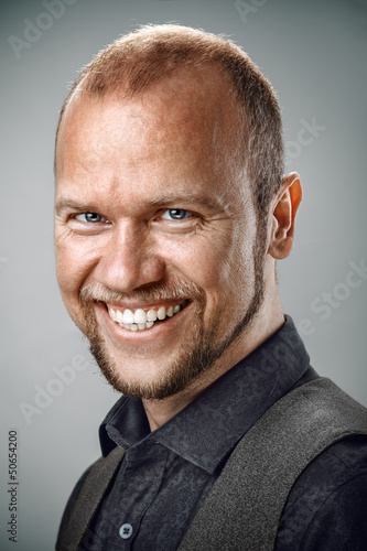 Photo: Portrait of happy smiling man Portrait of happy smiling man