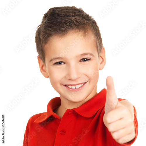 Photo: Happy boy showing thumbs up gesture Happy boy showing thumbs up gesture