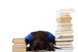 Teenage girl studying at the desk being tired