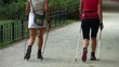 Vídeo: Nordic walking - active women exercising outdoor Nordic walking - active women exercising outdoor