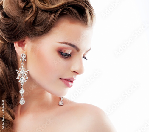 Photo: Aristocratic Lady with Diamond Earrings. Femininity Aristocratic Lady with Diamond Earrings. Femininity