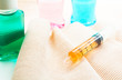 the vaccine in syringe and Elastic bandage