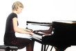 Foto: Piano playing pianist player with grand piano Piano playing pianist player with grand piano