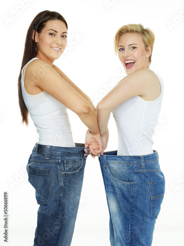 Photo: Beautiful girls are proud to lose weight, show their jeans Beautiful girls are proud to lose weight, show their jeans