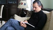 man reading book and get the bad news