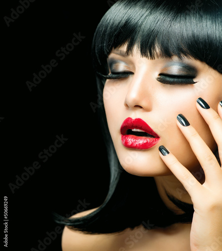 Photo: Fashion Girl Closeup. Red Lips And Black Nails Fashion Girl Closeup. Red Lips And Black Nails