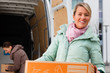 Female friends loading a moving truck